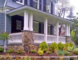 Custom porch balusters on a covered front porch railing