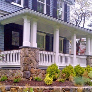 Custom porch balusters on a covered front porch railing