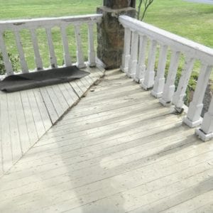 Before picture of rotted porch railings