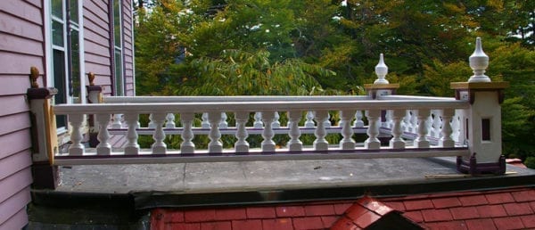 Accent spindles for a covered entry railing