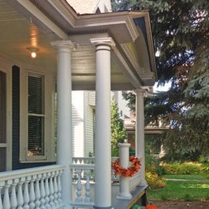 Front porch remodel with traditional railing and columns