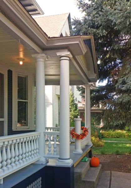 Front porch remodel with traditional railing and columns