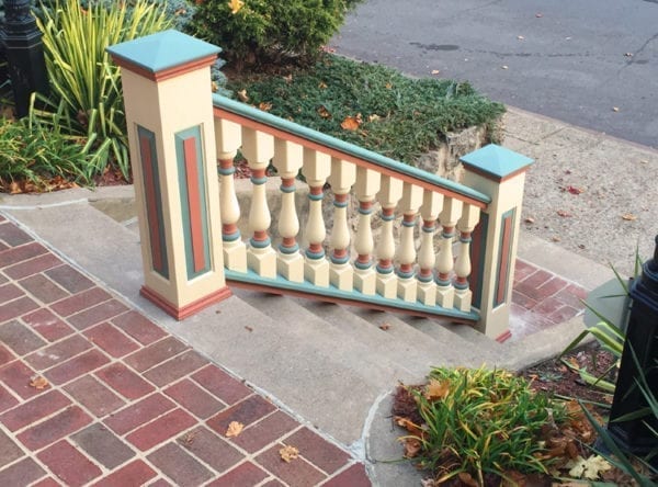 Victorian spindles on a front entry stair railing