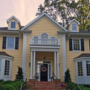 Covered front entry with balustrade