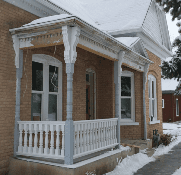 Small front porch with robust turned spindles