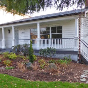 Square balusters on covered porch balustrade