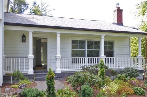 Porch railing with recessed panel column pedestals