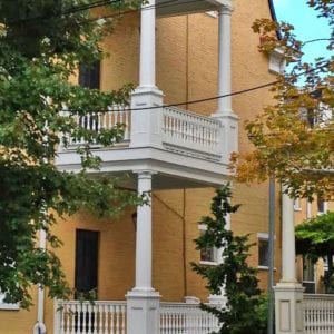 Recessed panel column pedestals and balustrade