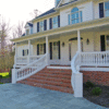 Covered porch low maintenance balustrade with curved stair rails