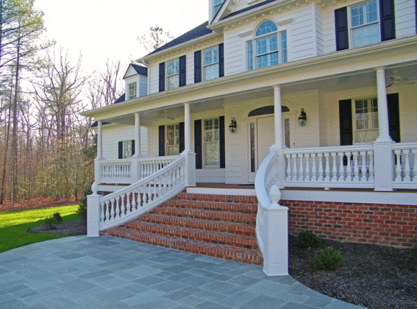 Covered porch low maintenance balustrade with curved stair rails