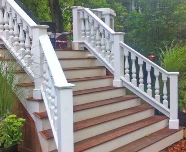 Stairs to deck with large cedar railings