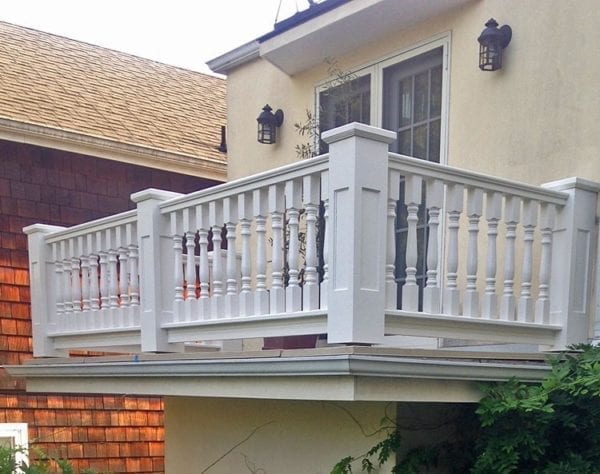 Classic balcony spindles and recessed panel newel posts and caps