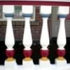multi colored Revival porch spindles