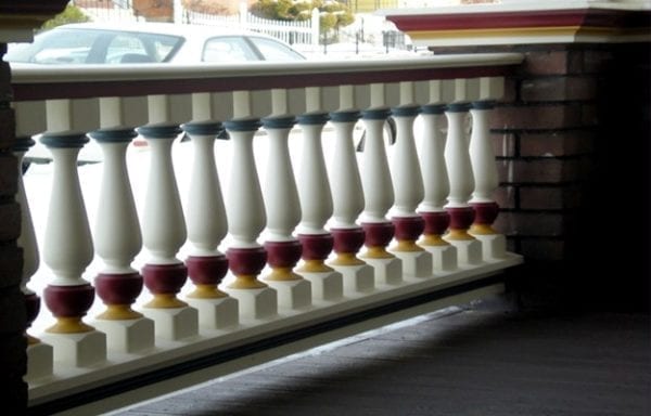 Revival porch spindles painted multiple colors