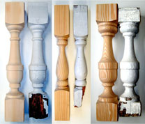 Reproduction wood porch balusters next to old originals