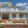 Tuscan porch spindles, raised panel newel posts, and columns