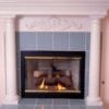 Round tapered columns used on fireplace mantle
