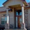 Covered entry with round tapered columns
