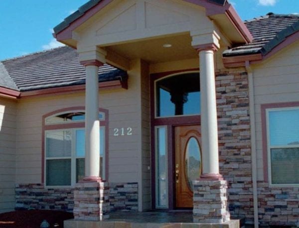 Covered entry with round tapered columns