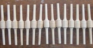 matching accent spindles next to original