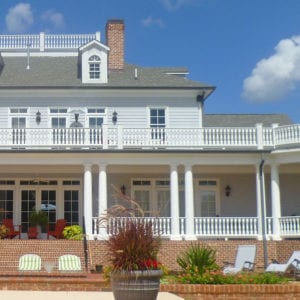 Two-story Porch with Victorian Porch Balusters and Curved Rail