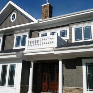 covered entry railing, recessed panel newel posts